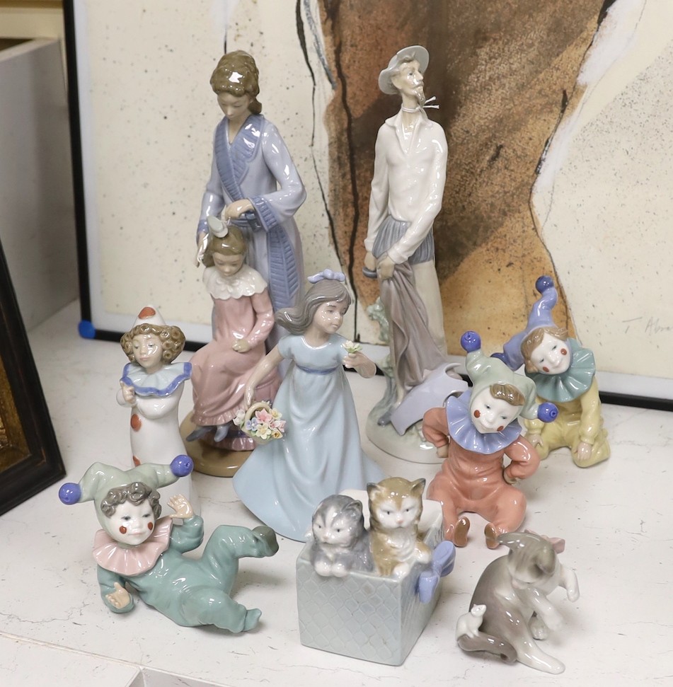 Nine Lladro and Nao figural and animal models, tallest 30cms high